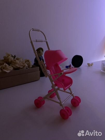 Игрушечная коляска