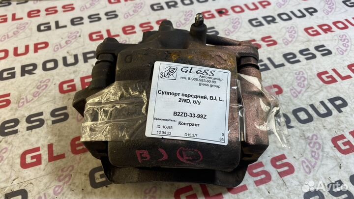 Суппорт передний BJ L 2WD б/у 323 Familia