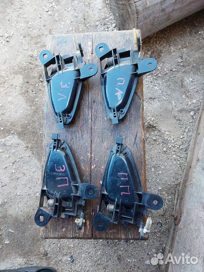 Внутренняя дверная ручка Нива Шевроле