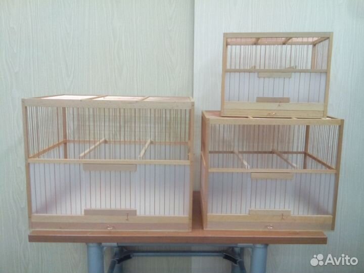 Клетки для птиц из дерева разные