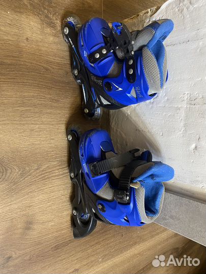 Роликовые коньки