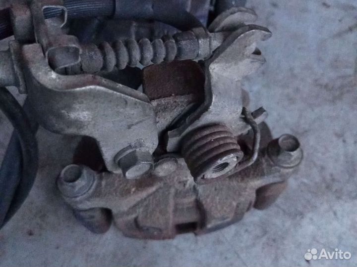 Суппорт задний левый и правый Mazda 6 GH