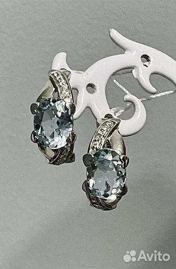 Серебряные серьги с голубым топазом