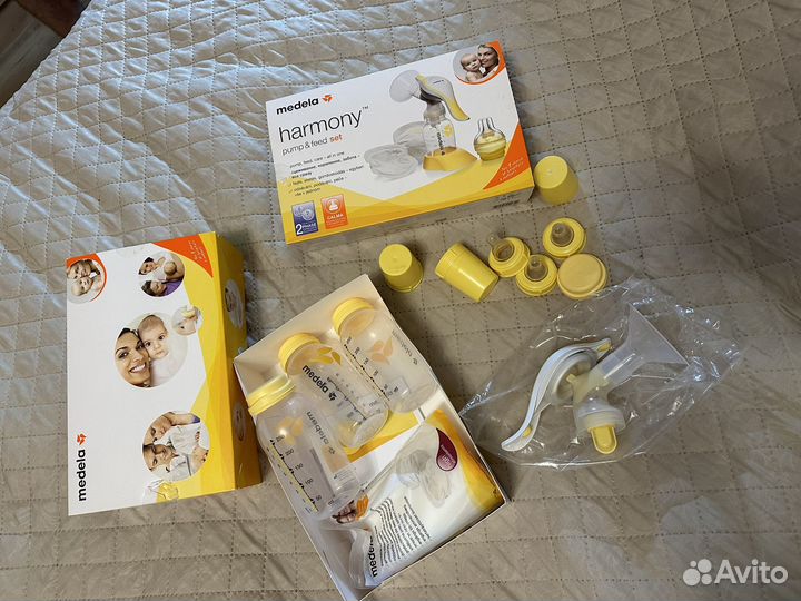 Ручной молокоотсос Медела и бутылочки