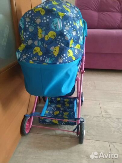 Игрушечная коляска для кукол