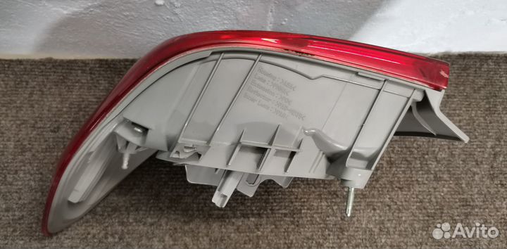 Фонарь левый внешний Toyota Corolla E150