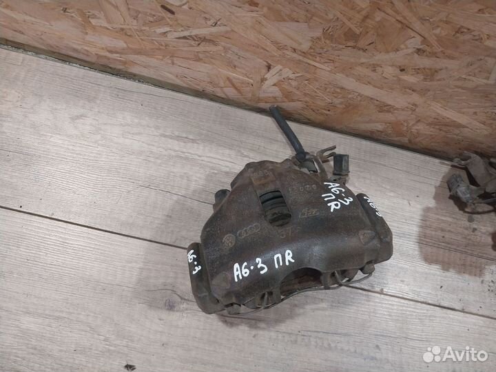 Суппорт тормозной передний Audi A6 C5 282мм