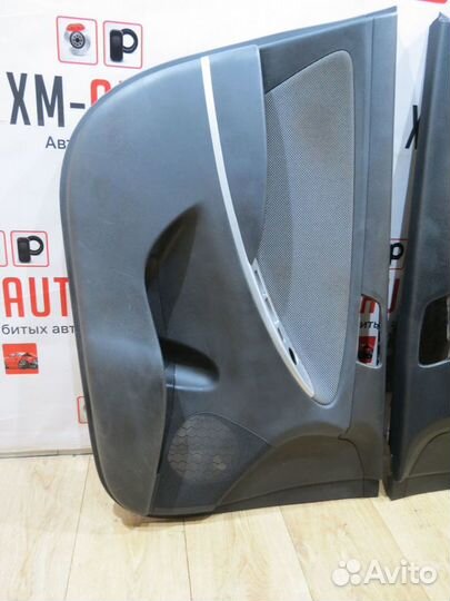 Обшивка передней двери Hyundai Solaris