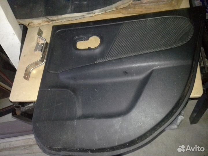 Обшивка двери правая задняя Nissan Note