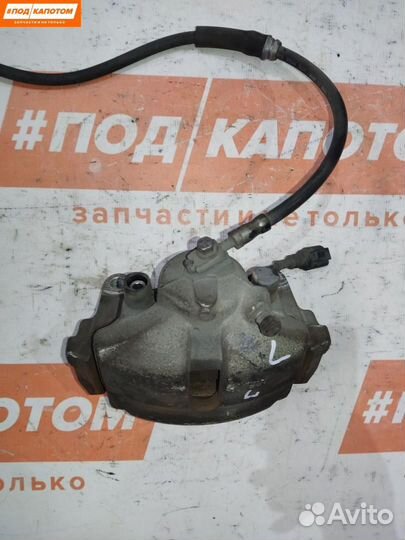 Суппорт тормозной передний левый seat Leon 2 рест