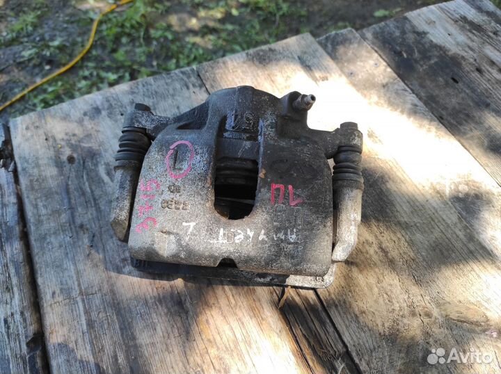 Суппорт тормозной передний левый Chery Amulet