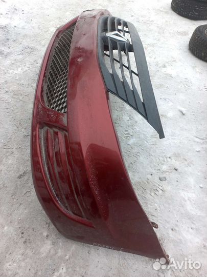 Бампер передний решетка радиатора Renault Logan 1