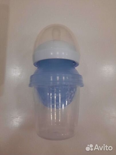Молокоотсос Avent ручной с бутылочками и ёмкостями