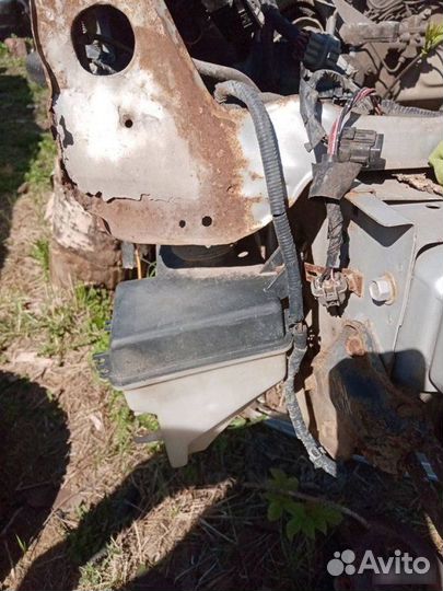 Бачок омывателя Nissan Primera Р11