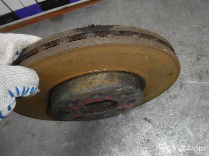 Тормозной диск передний левый Opel Corsa D Z12XEP