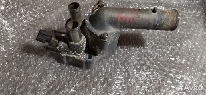 Корпус термостата Geely MK