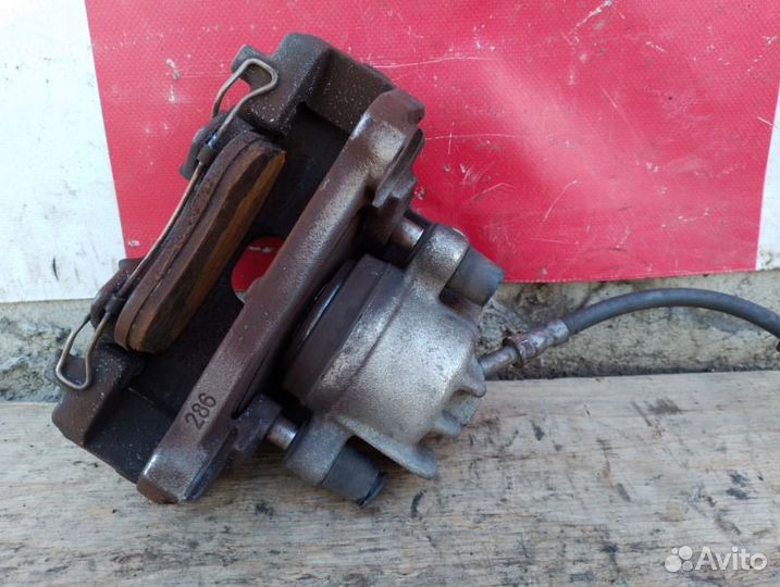 Суппорт тормозной передний левый Volvo S60 I 2.4