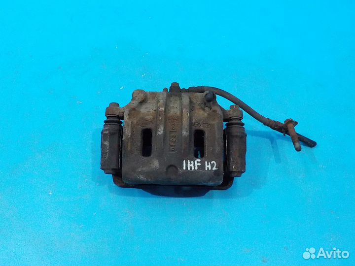 Тормозной суппорт передний левый KIA Sorento 1 200