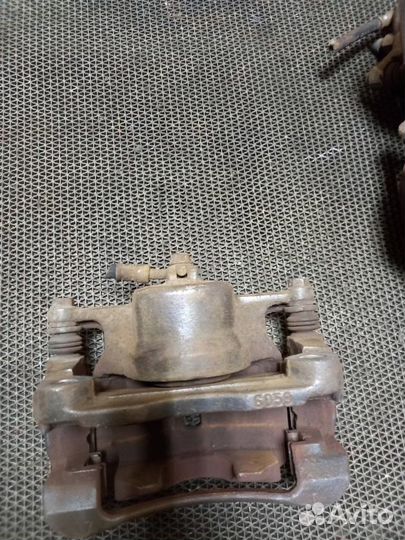 Суппорт передний левый nissan qashqai J10