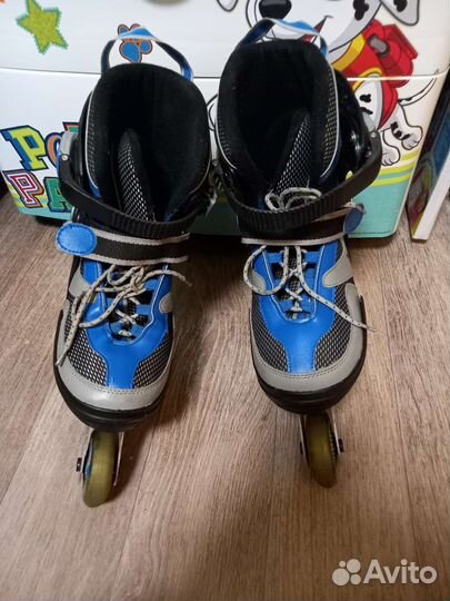 Роликовые коньки