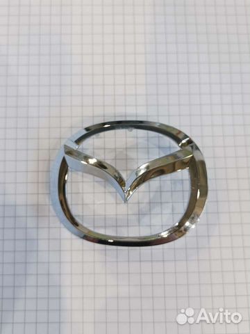 Эмблема на руль mazda 3 bl