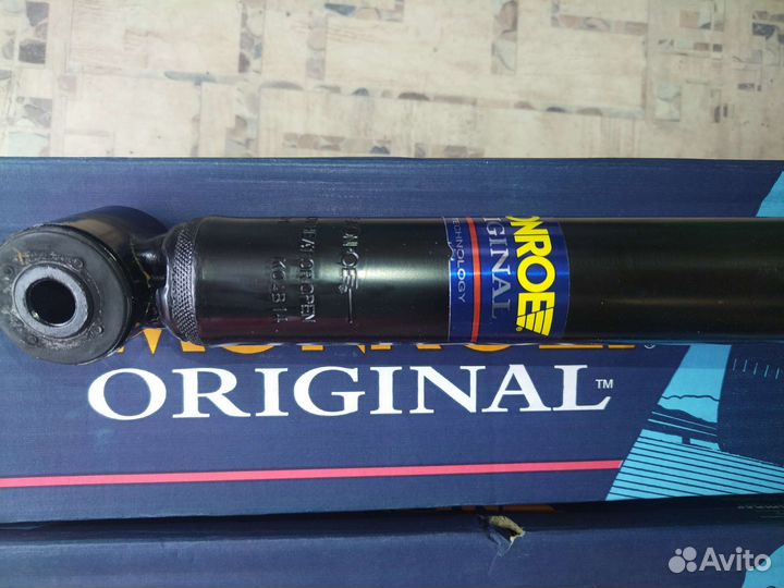 Стойка амортизатора задняя Ford Fiesta 95-01