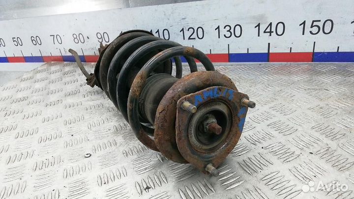 Стойка амортизатора переднего правого Nissan Almer