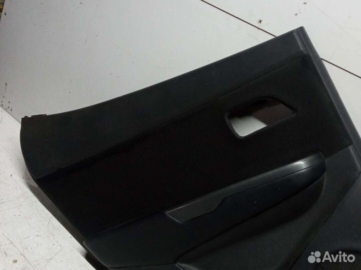 Обшивка двери задней левой Kia Rio 3