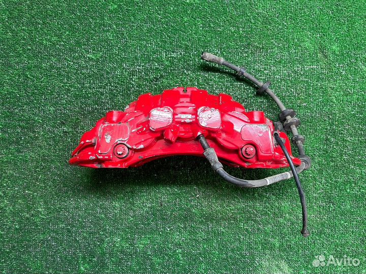 Суппорт передний левый Porsche Macan