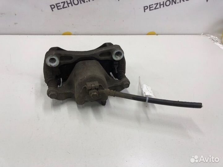 Суппорт тормозной передний левый Nissan Juke