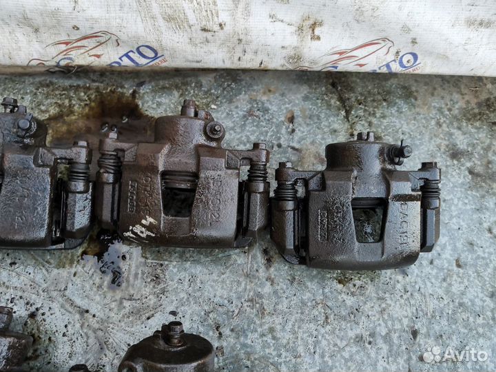 Суппорт тормозной передний левый Chevrolet Lacetti