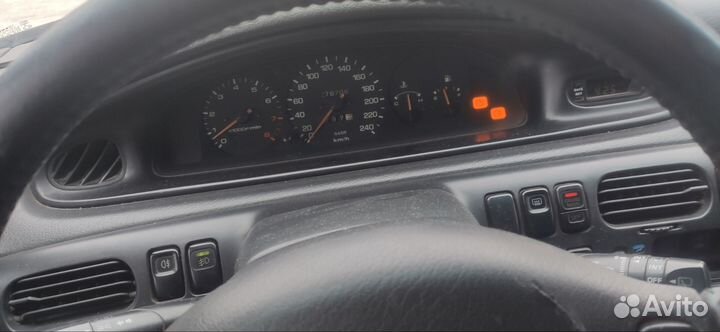 Суппорт тормозной задний Мазда 626 GE 1997