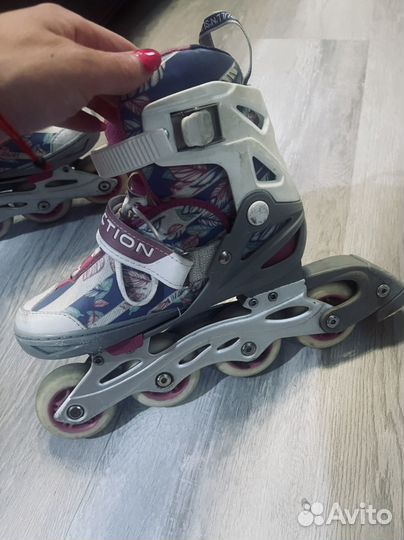 Роликовые коньки