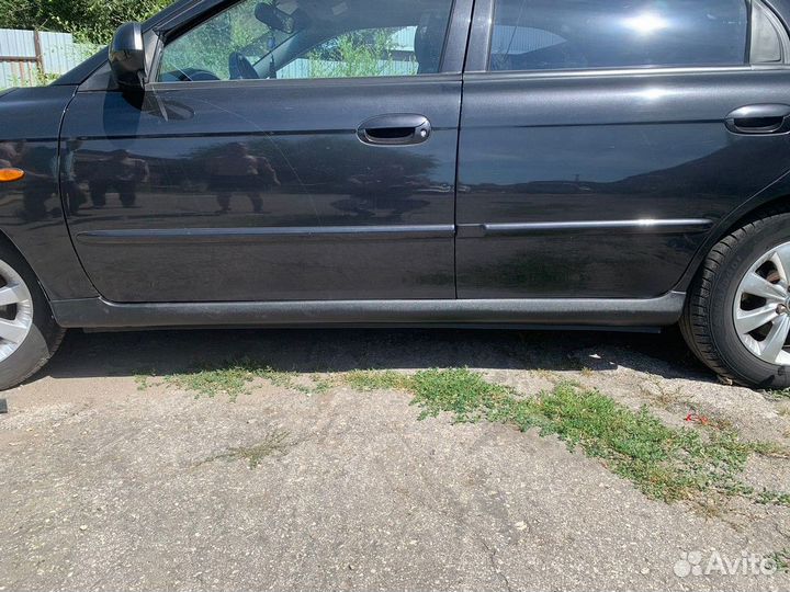 Накладки на пороги KIA Spectra - 2004-2011г.в