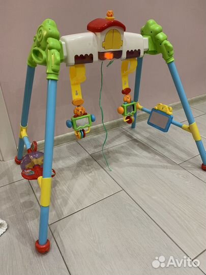 Игрушка и сиденье для ванны