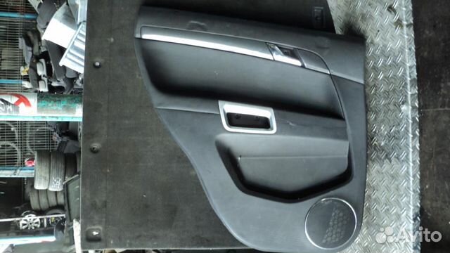 Обшивка двери задней левой Opel Antara