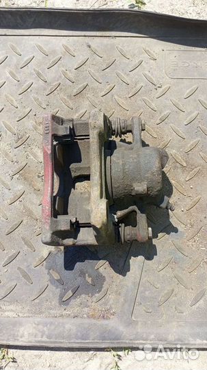 Суппорт передний nissan primera p11