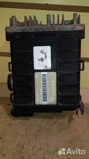 Блок управления двигателя VW Passat B3 1.8Б 88-93