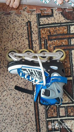 Роликовые коньки