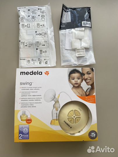 Молокоотсос medela swing электрический