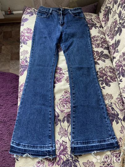 Джинсы клеш