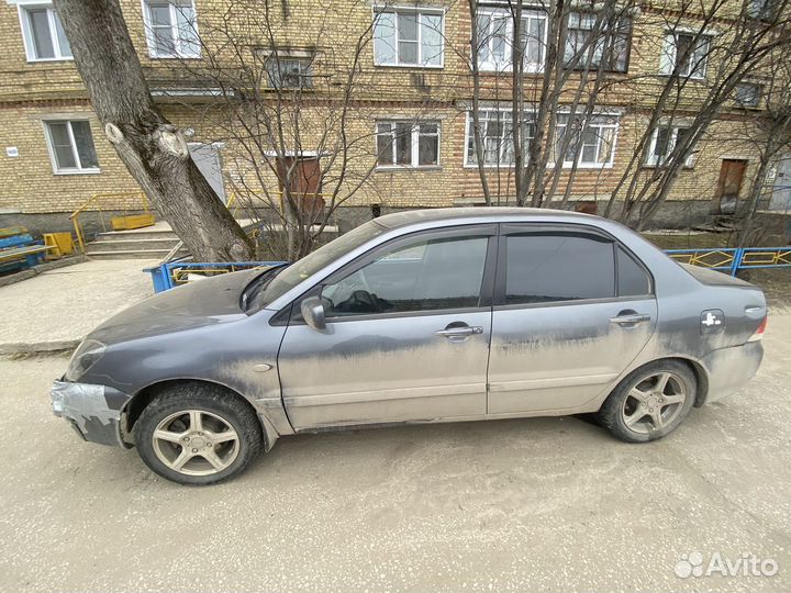 Машина mitsubishi lancer 9