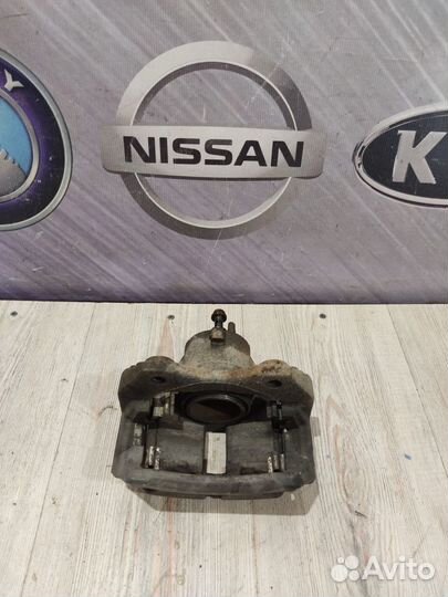 Суппорт тормозной перед Nissan primera P12 Лев