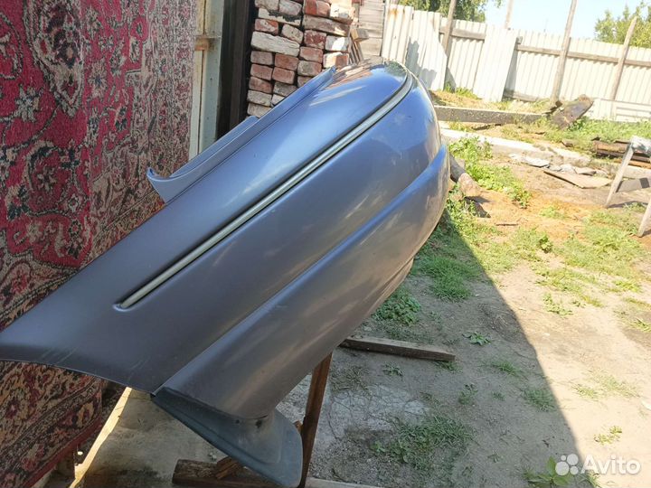 Задний бампер Chrysler Cirrus 1997