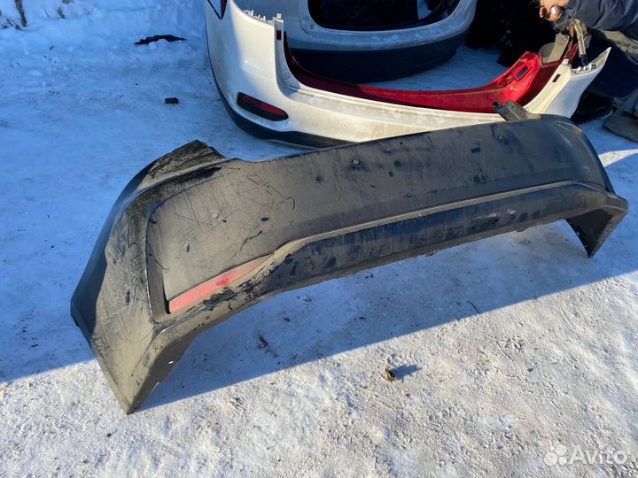 Задний бампер Toyota Corolla E210