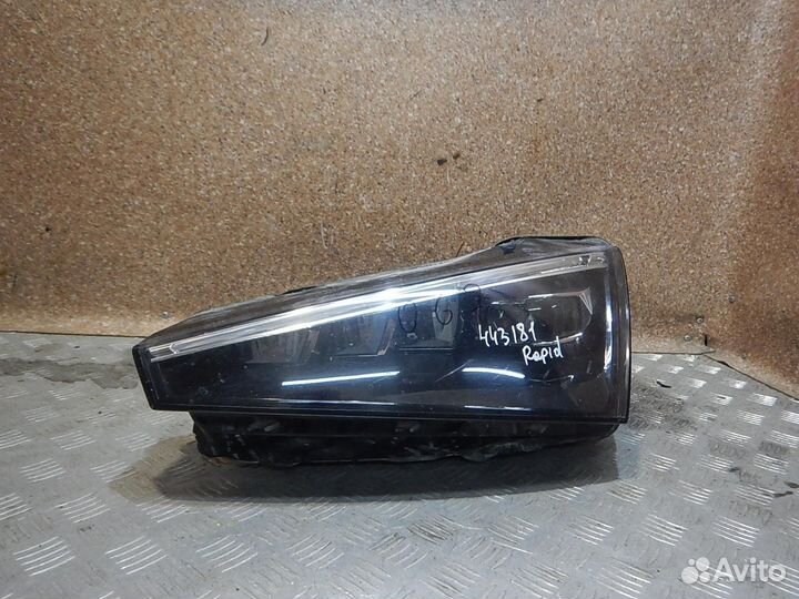 Фара левая Skoda Rapid