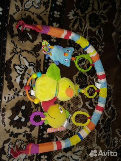 Дуга с игрушками-погремушками