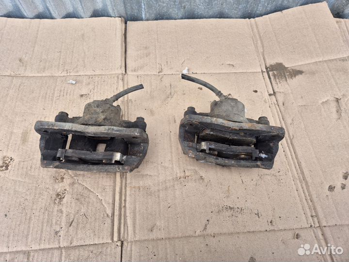 Суппорт передний Kia Spectra