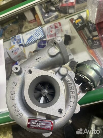 Новая Турбина оригинал Nissan 14411-EC00E Garrett