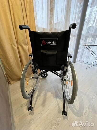 Инвалидная коляска